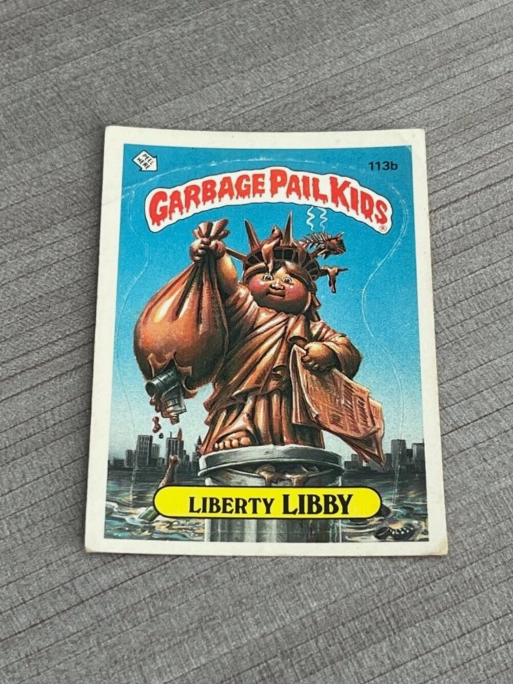 Garbage Pail Kids #113b Liberty Libby Trading Sticker Card (Barber Back)